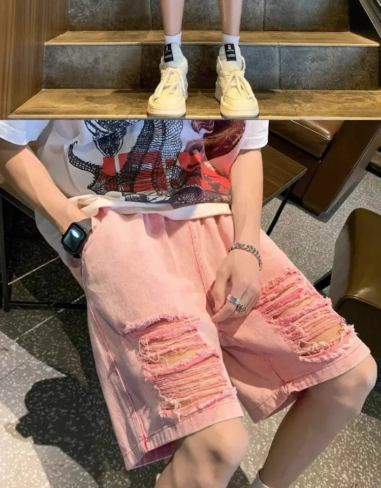 Pantalón corto vaquero rasgado